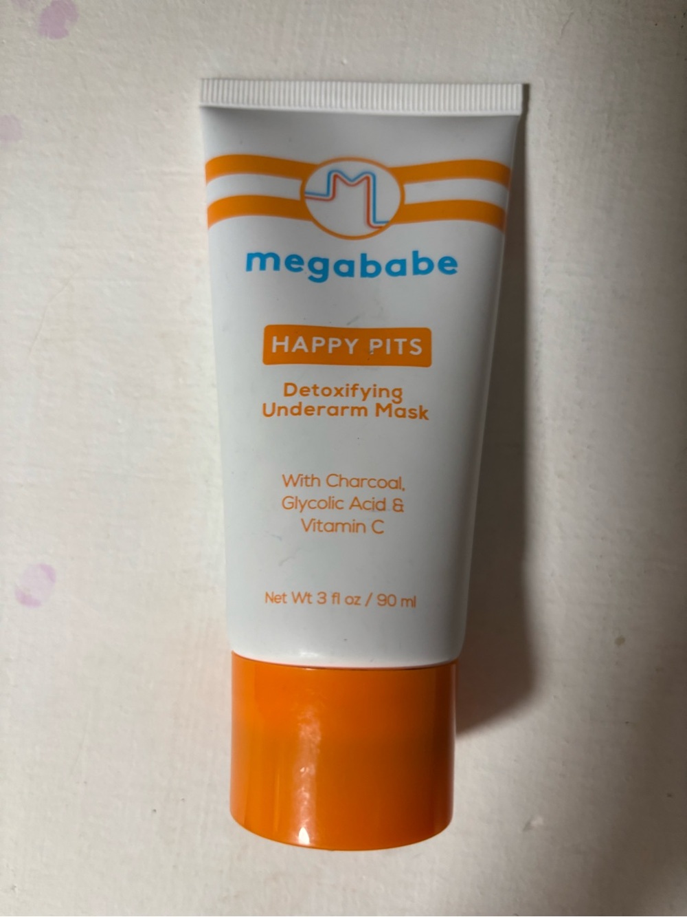 Megababe Happy Pits Detoxifying Underarm Mask — Orange/White